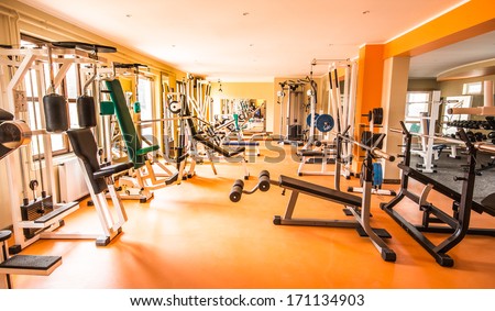 Interior view of a gym with equipment. Royalty-Free Stock Photo #171134903