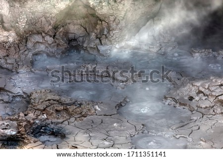 Boiling mud pools in Craters of the Moon geothermal area - Taupo, North Island, New Zealand
