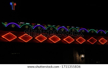 Restaurant closeup with colorful neon signs
