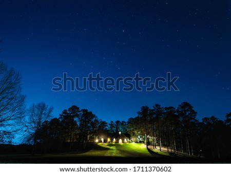 Beautiful antique church with gorgeous night sky above