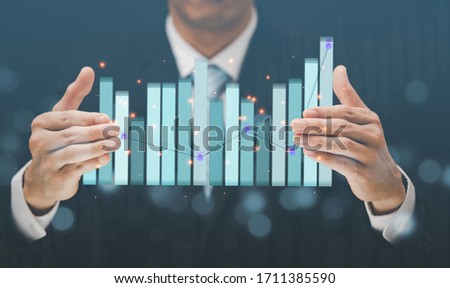 Businessman Touching in graph Screen Icon of a media screen, Technology Process System Business concept.