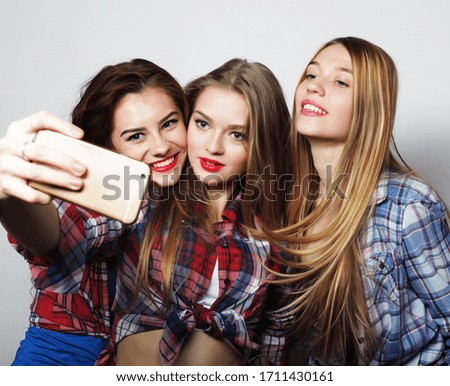 life style, happiness, emotional and people concept: funny girls, ready for party, selfie