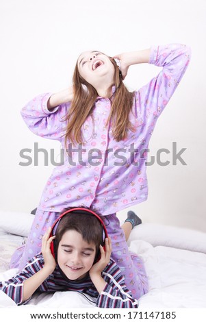young guys listening music in the room