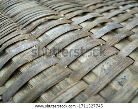 Photo of bamboo leather woven patterns that look unique,blurry beside.