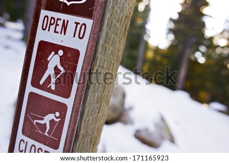 Trail Sign in Colorado Rocky Mountains. Hiking and Skiing Trail Access. Outdoor Photo Collection.