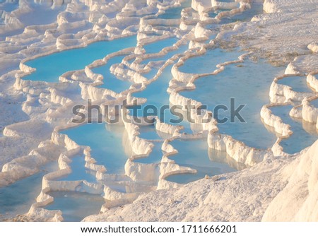 Pamukkale, Turkey - one of the most famous attractions of Turkey, Pamukkale is a Unesco World Heritage site. Here in particular the white travertine terraces Royalty-Free Stock Photo #1711666201