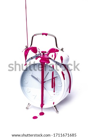 alarm clock white drenched with pink smudges on a white background vertical