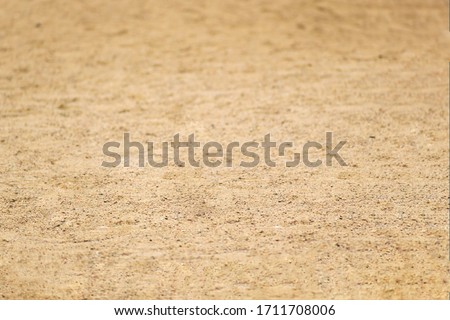 Ground texture background of beige desert soil, dusty land, dry sand.