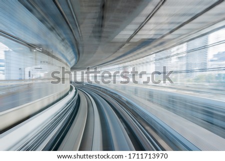 Motion blur on the moving train Yurikamome line in Tokyo, Japan.