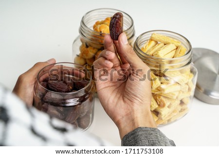 Dates fruit on white background. Medjool dried date palm fruits