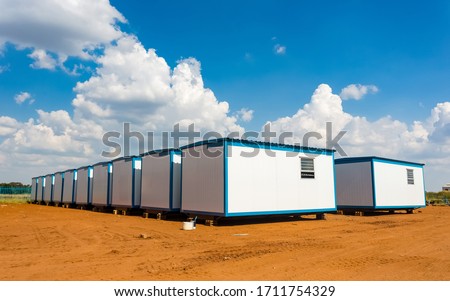 Relocatable mobile portable buildings used as prefabricated offices on building sites and other amenities  Royalty-Free Stock Photo #1711754329