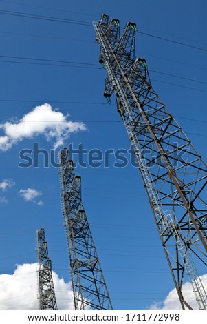 power line support against the blue sky
