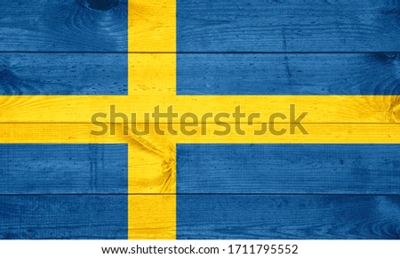 sweden flag painted on old wood background