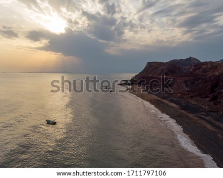 Aerial view of a boat during sunset in the Silver Beach in Hormoz in Iran