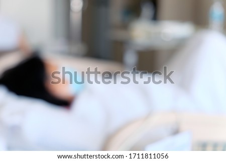 Abstract blur of Elderly patients in hospital bed background