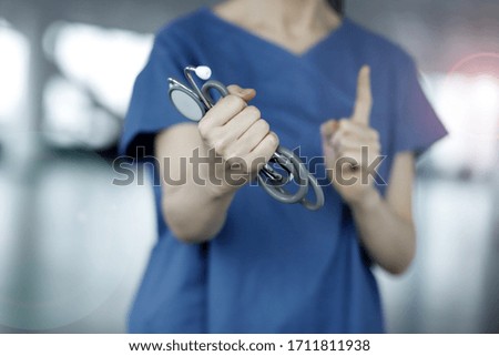 Close up of doctor holding stethoscope.Health care and medicine concept