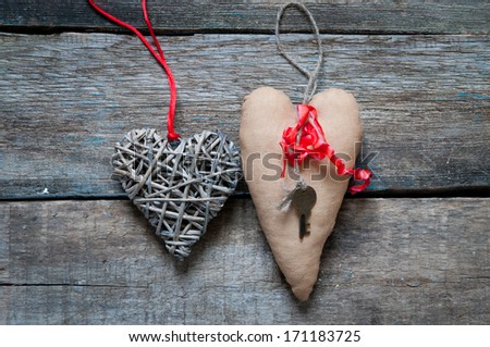 Valentines day background/two hearts on a wooden background