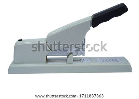 White stapler isolated on the white background. Office equipment concept.                              