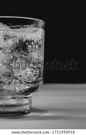 a glass with ice cubes