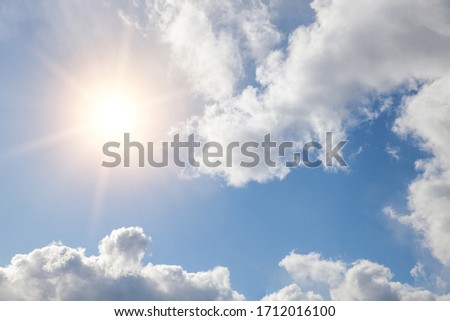 beautiful sky with clouds and bright sun Royalty-Free Stock Photo #1712016100