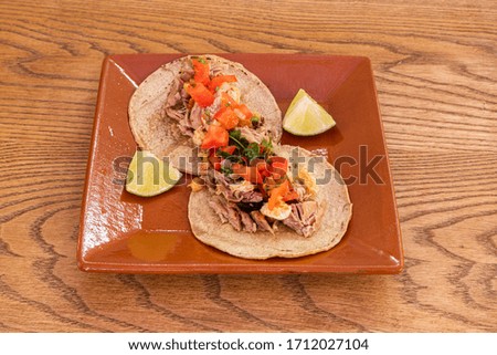 Traditional Mexican tacos with corn tortilla