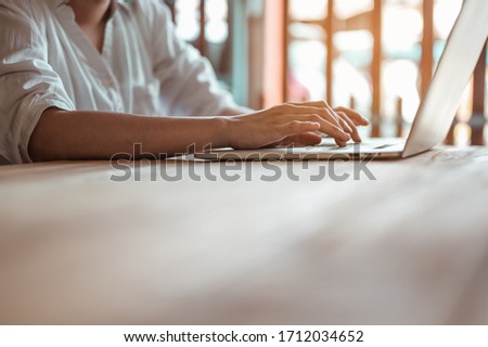 Woman work from home wearing mask protection wait for epidemic situation to improve soon at home. Coronavirus, covid-19, Work from home (WFH), Social distancing, Quarantine, Prevent infection concept. Royalty-Free Stock Photo #1712034652