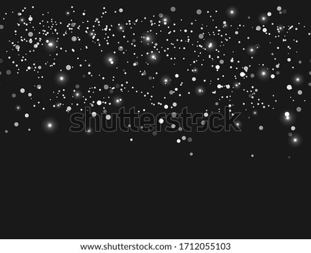 abstract winter background with white snowflakes on black