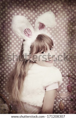 vintage easter bunny girl with funny ears on  background with dots (sepia )