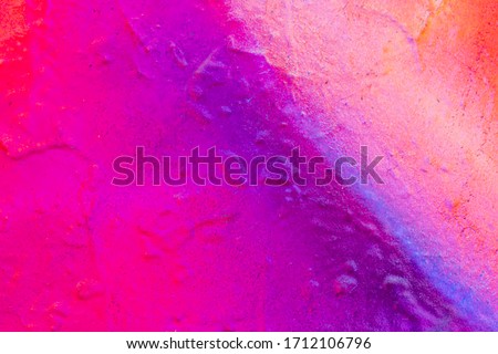 Beautiful bright colorful street art graffiti background. Abstract creative spray drawing fashion colors on the walls of the city. Urban Culture, black , red , orange , yellow, green, blue texture Royalty-Free Stock Photo #1712106796