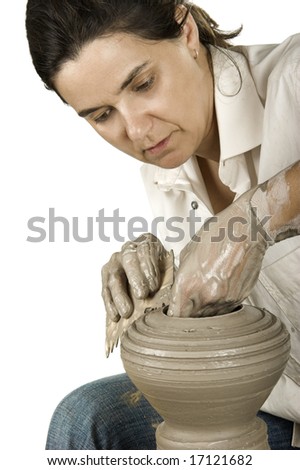 Picture of a potter works a potter's wheel