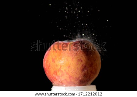 Fruits with drop of water with black background
