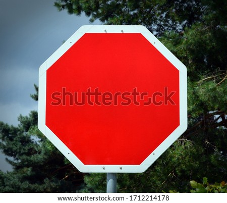 Closeup blank red road or street traffic warning stop sign with copy space