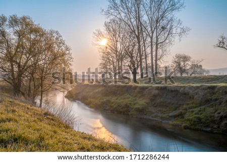 River in colorful atmospheric sunlight mood in the morning