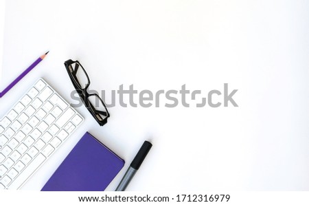Flat lay from office supplies on white background with copy space. Home work and remote work.