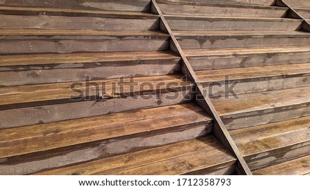 old and wet wooden stairs leading up