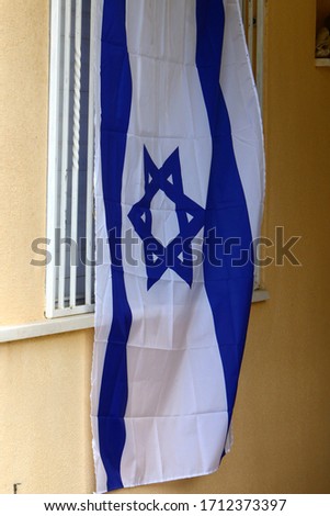 white-blue Israeli flag with a star of David