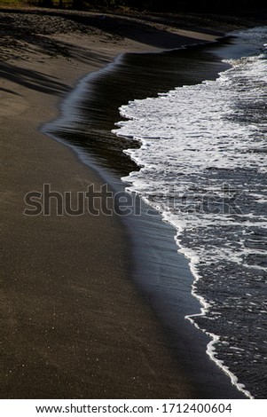 Mt. Wynne black sand beach in St. Vincent