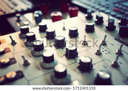 Synthesizer and effects music producer studio selective focus on middle Royalty-Free Stock Photo #1712401318