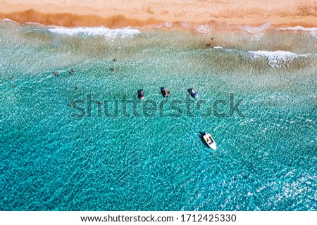 Aerial shot of beautiful turquoise beach Falasarna (Falassarna) in Crete, Greece. View of famous paradise sandy deep turquoise beach of Falasarna (Falassarna) in North West, Crete island, Greece. Royalty-Free Stock Photo #1712425330