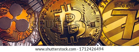 Set of cryptocurrencies with Bitcoin, Etherium, Ripple, Litecoin. Cryptocurrencys new digital money. Bitcoin on the front as the leader. Bitcoin as most important cryptocurrency.
