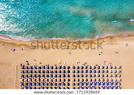 Aerial shot of beautiful turquoise beach Falasarna (Falassarna) in Crete, Greece. View of famous paradise sandy deep turquoise beach of Falasarna (Falassarna) in North West, Crete island, Greece. Royalty-Free Stock Photo #1712428669