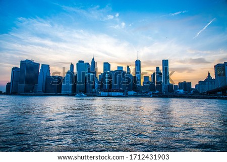 Downtown New York skyline from cross the Brooklyn bridge -Dumbo area.  