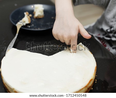the child pierces the pie with his finger, wants to know what consistency, experiments, learns the world