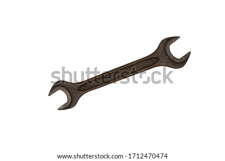 old rusty wrench isolated on white background