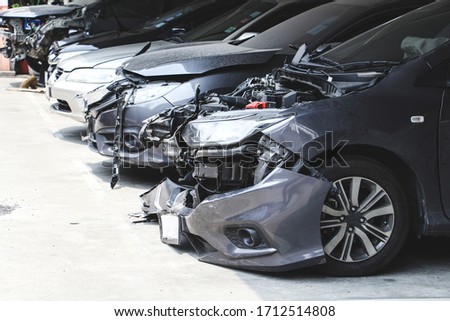 Many Car wreck in the parking with crash big damaged and broken . Car accident and safety concept. Royalty-Free Stock Photo #1712514808
