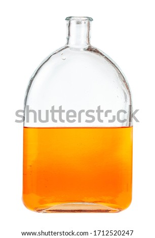 solution of orange watercolour in water in glass flask isolated on white background