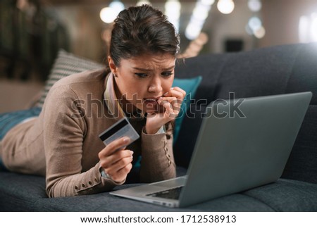 Businesswoman buying online. Beautiful woman with laptop and credit card. 