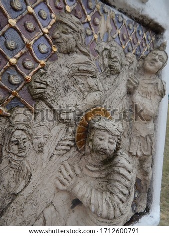 Close-up pictures of the statues of the Stations of the Cross at the christian calvary hill in Szár