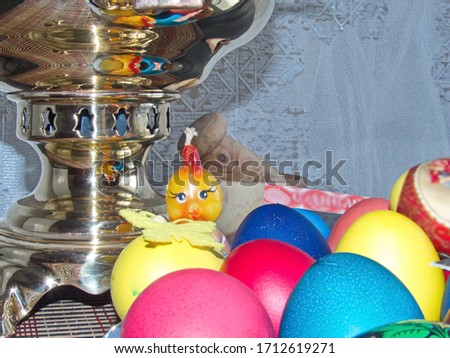 Sparkling samovar and colorful Easter eggs - part of the passover meal. Easter (Bright Sunday of Christ) is the oldest and most important Christian holiday. Happy Day Bright Easter! 