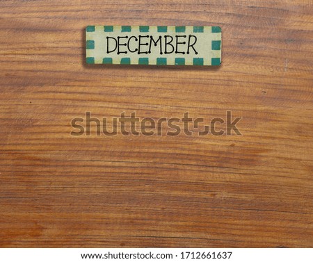 Vintage calendar  handmade from wood on wooden wall, on September of the year.